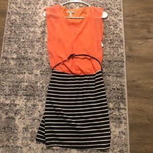 A orange and black and white stripe dress